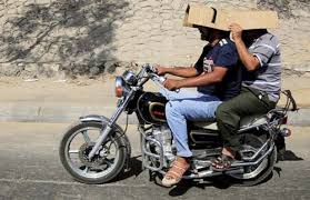 hot sun motorcycle riding in india